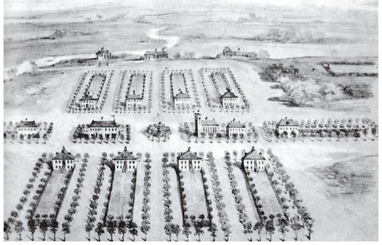 Litografia da planta de uma vila agrícola com traçado geométrico simétrico, contendo casas assobradadas, jardins retangulares com árvores, uma praça central com fonte e edificações maiores. Ao fundo, avista-se a várzea e o rio.