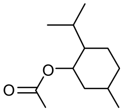 Fórmula estrutural de um monoterpeno (acetato de mentila), apresentando um anel de seis membros com uma ramificação isopropila, uma ramificação metila e um grupo acetato