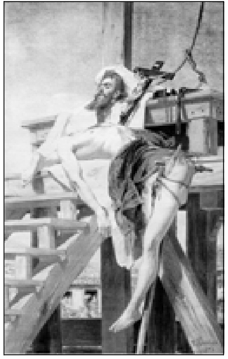 Pintura de Pedro Américo mostrando partes esquartejadas do corpo de Tiradentes dispostas sobre o cadafalso de madeira, com a cabeça decepada e uma cruz ao fundo.
