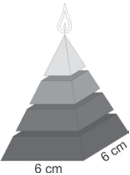 F2 Vela em forma de pirâmide quadrangular, dividida em quatro blocos separados: três troncos de pirâmide e uma pirâmide no topo. Duas arestas da base estão indicadas como 6 cm.